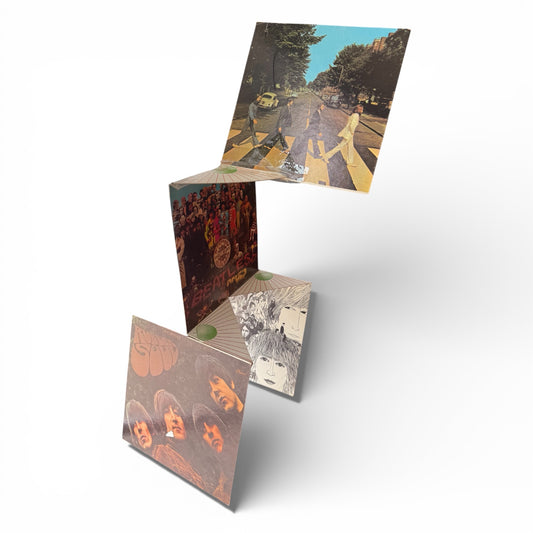 Original 1969 Beatles retail mobile Hung Up For A Gift Give The Beatles green header card with original hanging wire and Magical Mystery Tour panel