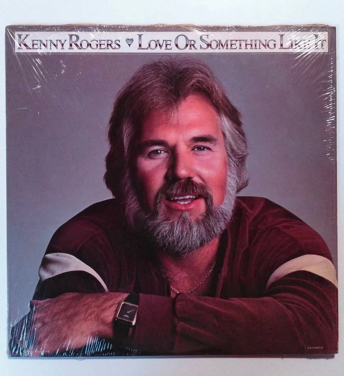 Love or Something Like It: Kenny Rogers, Roasted Chicken, and Lou’s Crisis of Conscience