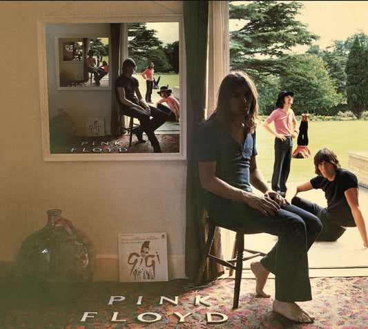 Pink Floyd’s Ummagumma album cover with the band arranged around a doorway and a repeating framed image.