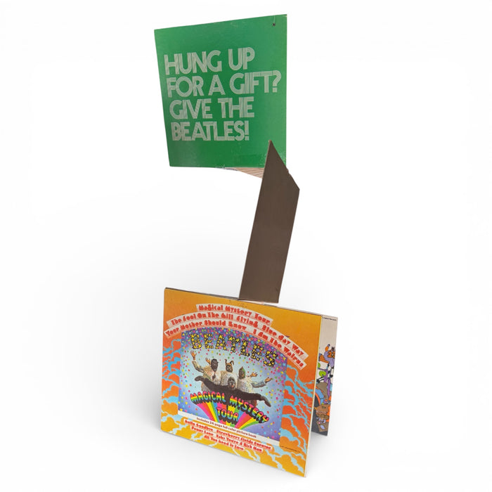 Complete original 1969 Capitol Records Beatles Christmas retail hanging mobile showing all seven album cover panels assembled with sunburst connectors