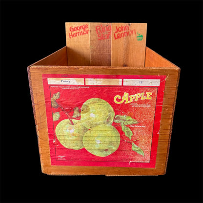 Authentic Apple Records store display crate with John Lennon, George Harrison, and Ringo Starr planks