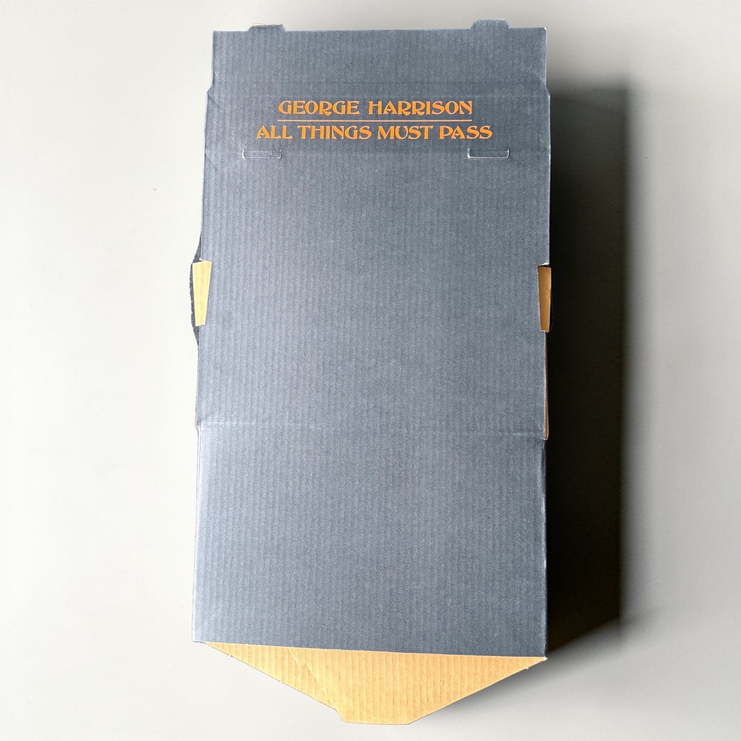 1971 George Harrison All Things Must Pass tape merchandiser display bin side panel George Harrison All Things Must Pass orange text on slate blue corrugated cardboard mint condition