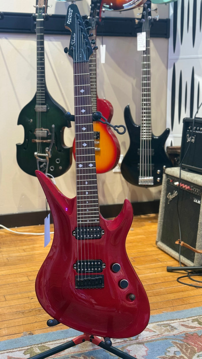Red Schecter Diamond Series A-7 seven-string guitar, full front view
