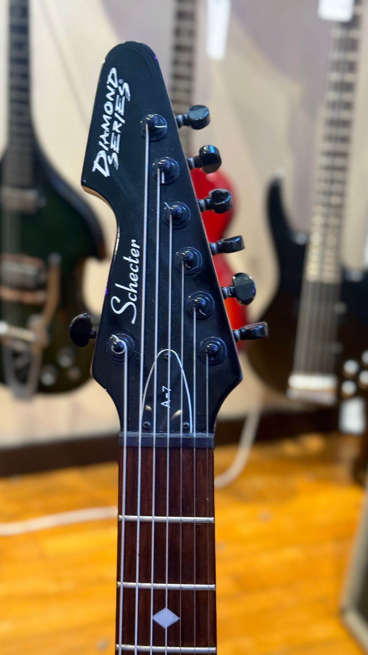 Schecter Diamond Series headstock and A-7 model marking