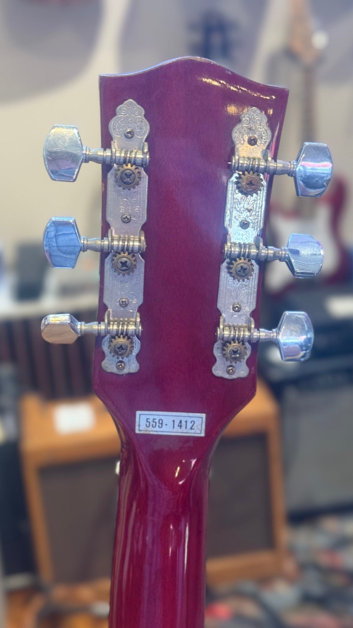 Unbranded SG-style guitar — rear headstock, open-gear tuners and 559-1412 label